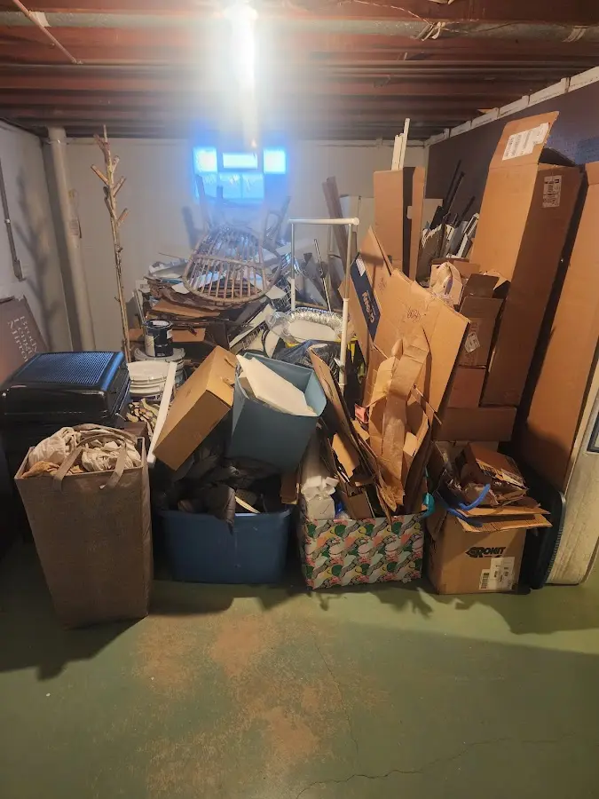 Roll-off dumpster container at job site for Yard Waste Dumpster Rental in Riverwoods